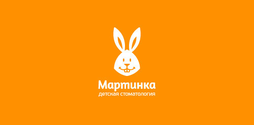 卡通兔子logo设计:儿童牙科诊所品牌